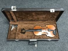 A late nineteenth century violin and bow in a hard case with key, bearing label 'The Maidstone,