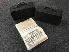 A folder or war time newspapers and two bugle cases