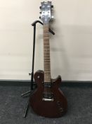 A Dean electric guitar on guitar stand