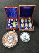 A cased onyx teapot and six sake cups,