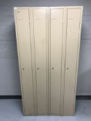 A pair of metal double door lockers