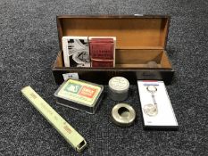 A Victorian poker work containing black and white postcards, playing cards,