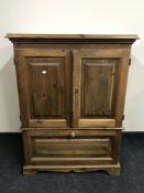 A pine television cabinet