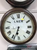 A 19th century and later oak circular wall clock,