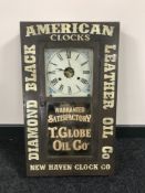 A painted oak cased American wall clock with sign writers advertising