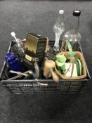 A box containing demijohn's, a four point five litre captain Morgan's whiskey bottle,