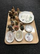 A tray containing three Hummel figurines, assorted Peter Rabbit dishes,