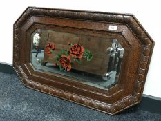 An antique octagonal framed mirror