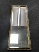 A gilt framed rectangular mirror, 44.5 cm x 126.