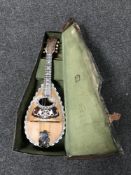 A late nineteenth century mother of pearl inlaid mandolin by G.