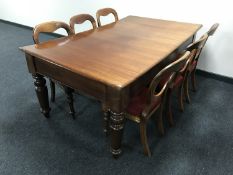 A Victorian style mahogany dining table on reeded legs,