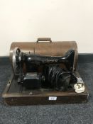 A mid twentieth century cased Singer sewing machine