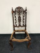 A carved Victorian mahogany bedroom chair (re-upholstery project)