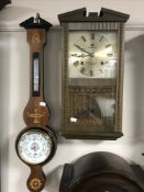 A contemporary gold time Italian barometer and a Majesty 31 day wall clock