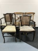A pair of mahogany framed bergere backed armchairs,