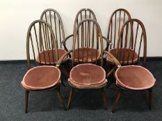 A set of six Ercol dining chairs;