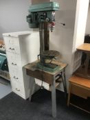 A NuTool sixteen speed drill press on stand