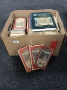 A box containing vintage ordnance survey maps,