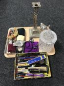 A tray containing a cut glass lidded biscuit barrel,