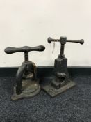 Two vintage industrial metal presses