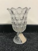 An antique moulded glass vase