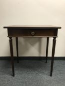 A Regency style inlaid mahogany side table,
