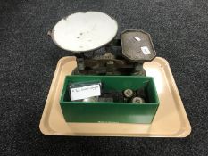 A tray containing a set of Fairbanks vintage kitchen scales,