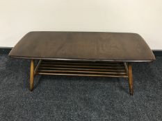 A Ercol elm coffee table with undershelf