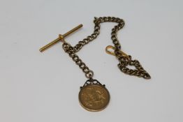 A gold sovereign 1899 within 9ct gold mount,