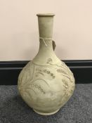 A La Rambla unglazed earthenware vase with slip-trailed decoration in relief with impressed marks,