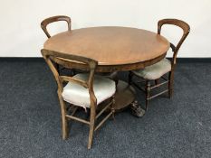 An early Victorian mahogany breakfast table on paw feet,