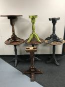 Four wooden circular bar tables on pedestals,