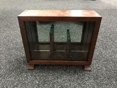 A glazed pistol display case