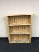 A set of reclaimed pine open bookshelves