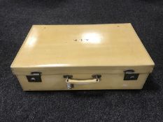 A mid twentieth century pig skin luggage case bearing the initials A.I.E.