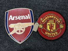 Two cast iron football crest plaques,