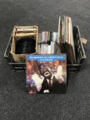 A box containing LP's, 45's and CD's, including Bing Crosby, Blondie,