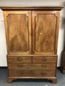 An early 19th century mahogany press,