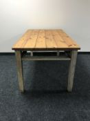 A pine plank top kitchen work table