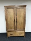 An early twentieth century gentleman's double door wardrobe