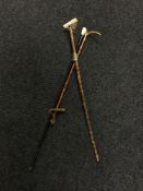A late nineteenth century bone handled riding crop with silver mount,