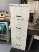A painted metal four drawer filling cabinet
