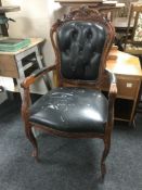 A reproduction armchair,