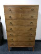 A mid twentieth century continental seven drawer chest