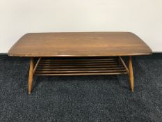 A Ercol elm coffee table with undershelf