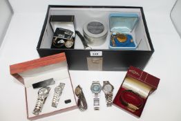 A box of various wristwatches