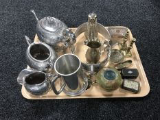 A tray containing a three piece Walker and Hall Sheffield plate embossed tea service,