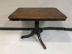A Victorian tilt topped table
