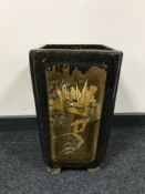 A Chinese earthenware glazed planter with panels depicting bamboo and birds, height 44 cm.