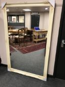 A Victorian style cream framed overmantel mirror ,